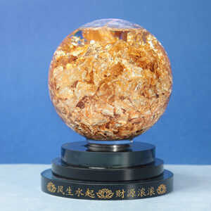Bola de cristal con oro laminado